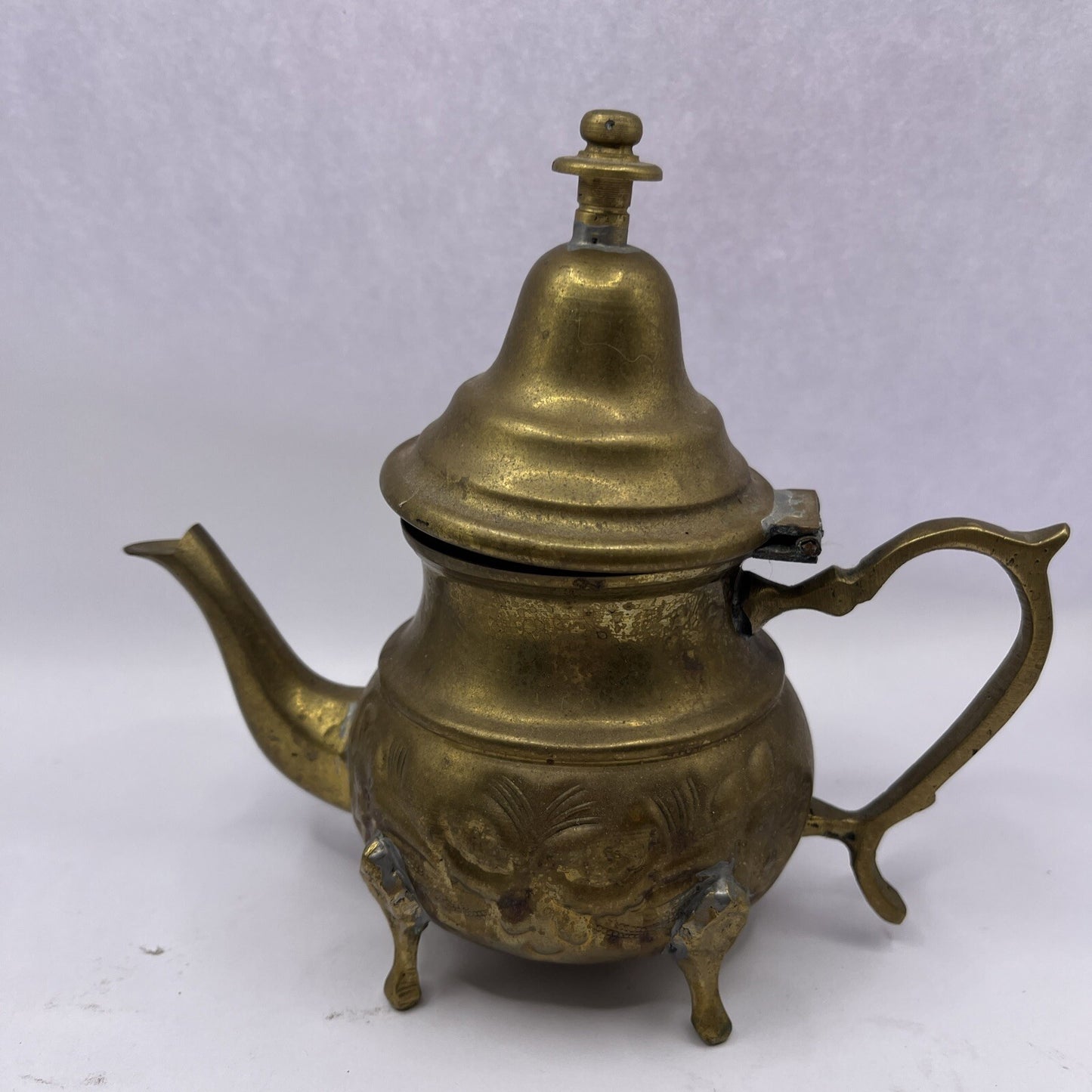 Vintage Middle East floral footed metal teapot
