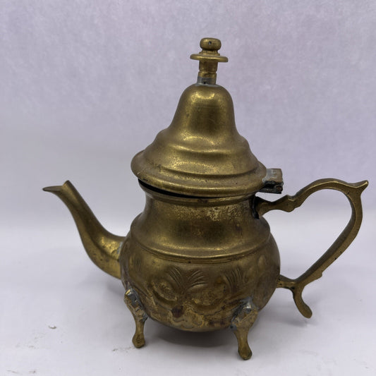 Vintage Middle East floral footed metal teapot