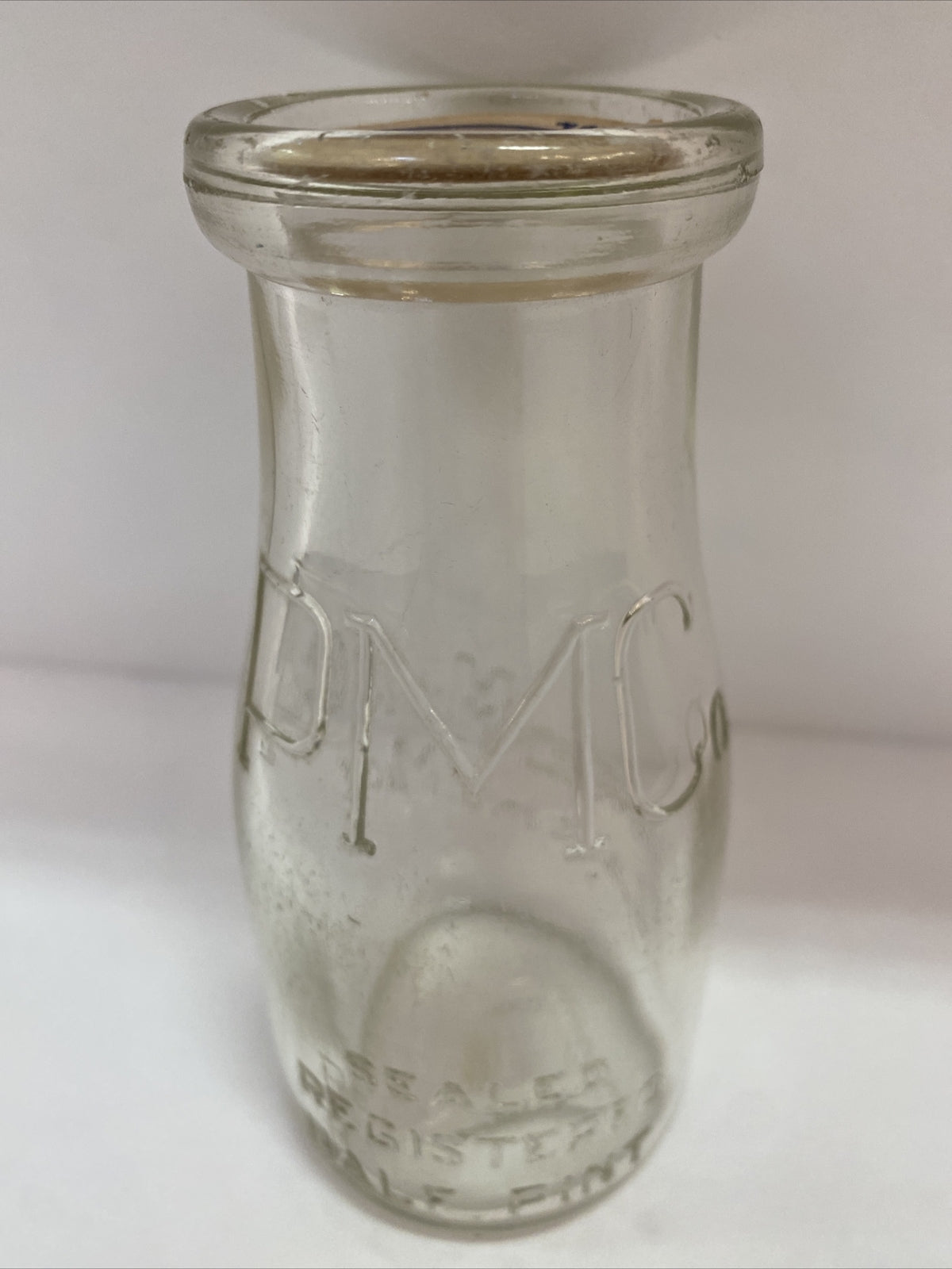 Pure Milk Dairy Co Lansing MI Michigan 1/2 pt half pint milk bottle clear PM Co