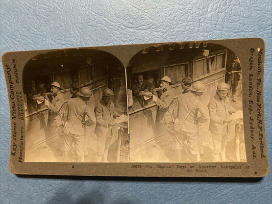 Real Photo Stereoview soldier buys an American Newspaper at the Front 