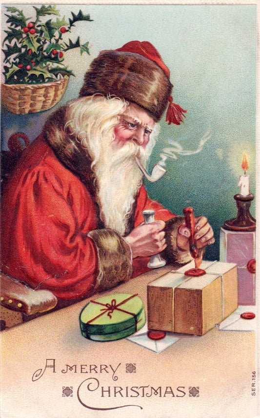 A Merry Christmas Santa Working on Toys in his Workshop Vintage Santa Postcard