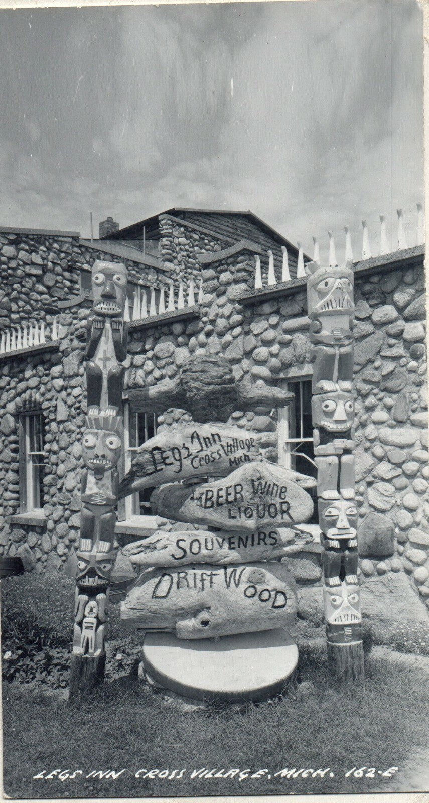 Real Photo Legs Inn Cross Village Michigan MI Postcard Statue and Totem Poles