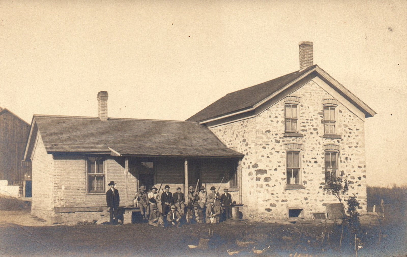 Group Photo Of Men with Guns on Front Porch Vintage Real Photo Postcard