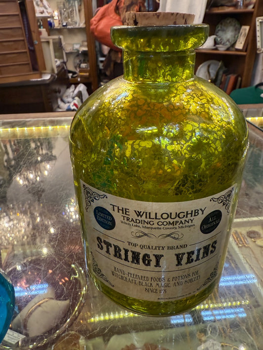 Stringy Veins Mercury bottle