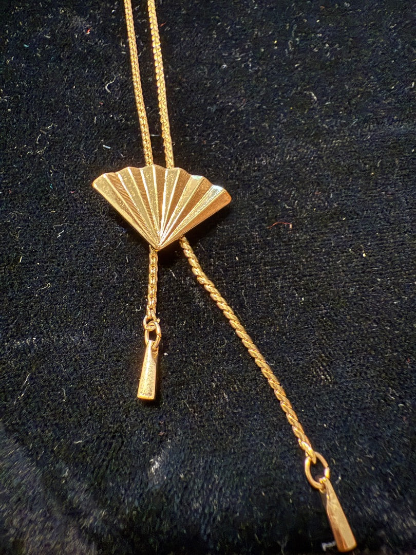 Vintage 1985 Avon Gold tone Fan Bolo slide Necklace