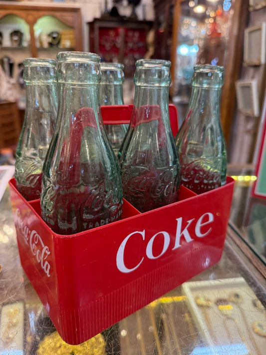 6 pack plastic Coca Cola carrier with bottles