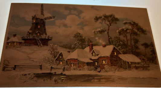 Snow Covered Wind Mill With Cabin