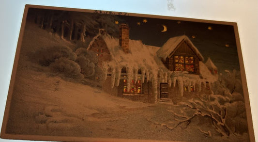 Snow covered Cabin In Woods At Night With Stars