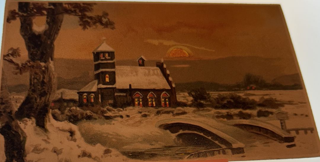 Snow covered Church With Bridge