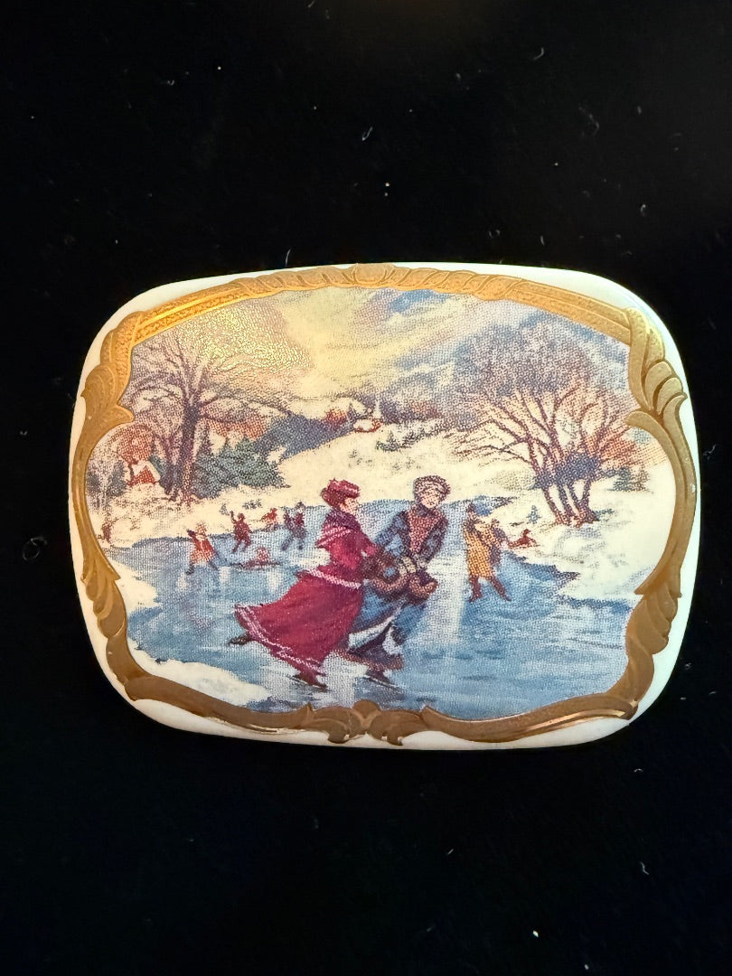 Porcelain Scenic Skating Christmas Brooch