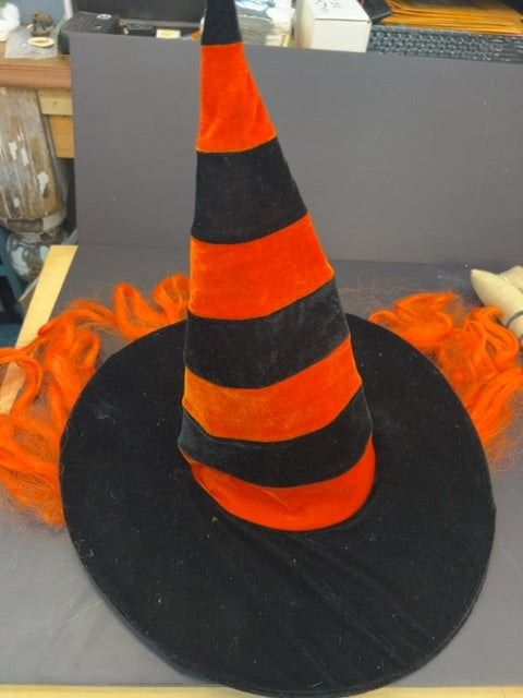 Black and orange witch hat with orange wig hair attached