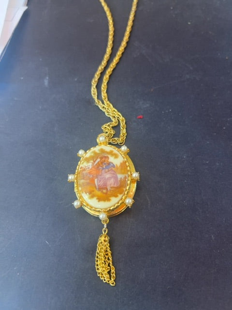 Locket with two girls on front