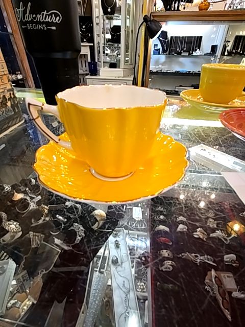 Yellow tea cup