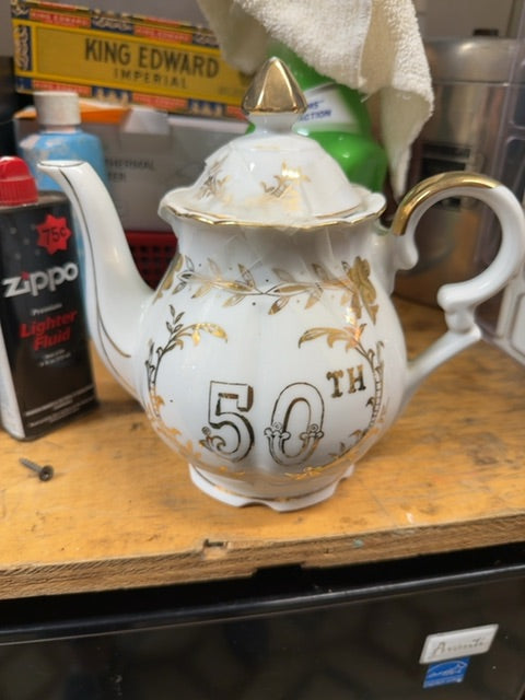 Left on 50th tea pot